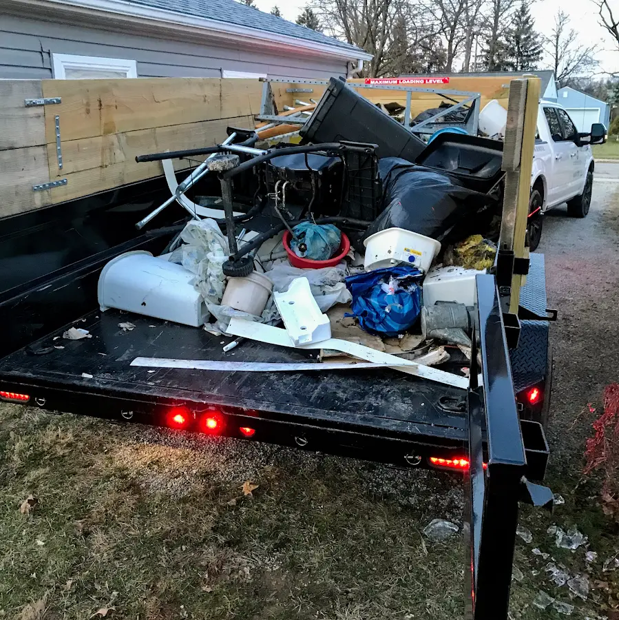 Roll-off dumpster delivered to a residential driveway in Bay City